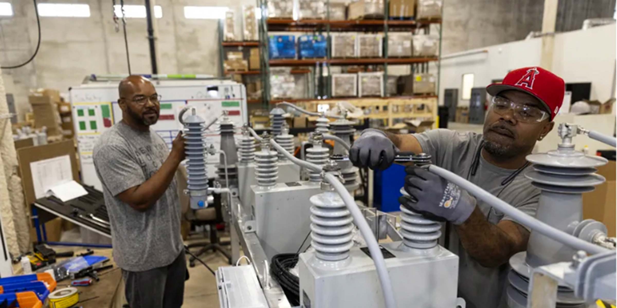 The Will Group employees working on electrical components