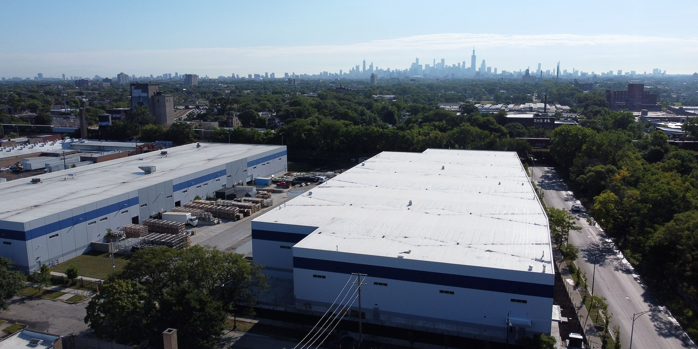 Arial photo of the K-Town Business Centre with the Chicago city skyline in the background