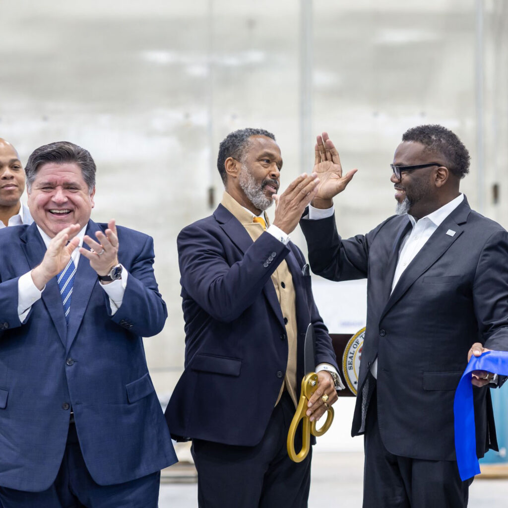 Ribbon cutting ceremony at K-Town Business Centre with Stephen Davis, Brandon Johnson, and Governor Pritzker